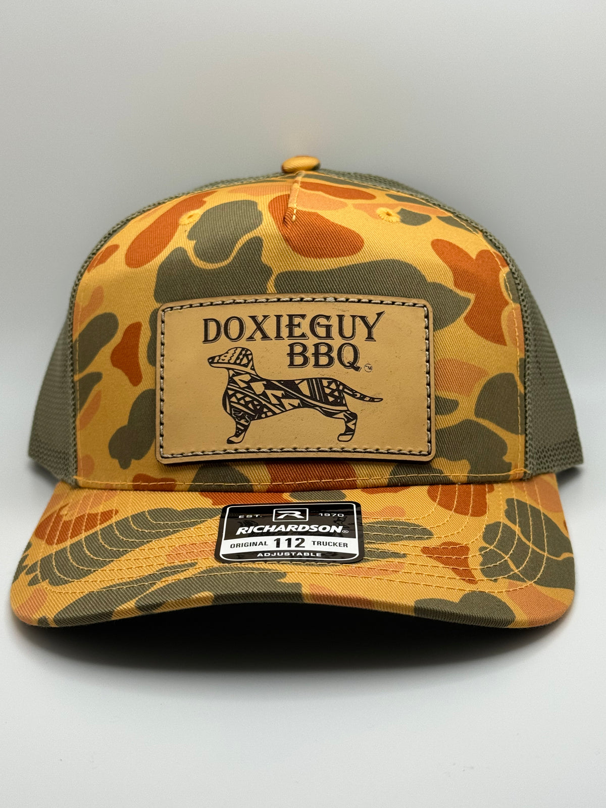 DoxieGuy BBQ Leather Patch Richardson 112 Trucker Cap Sienna Duck Camo/Loden