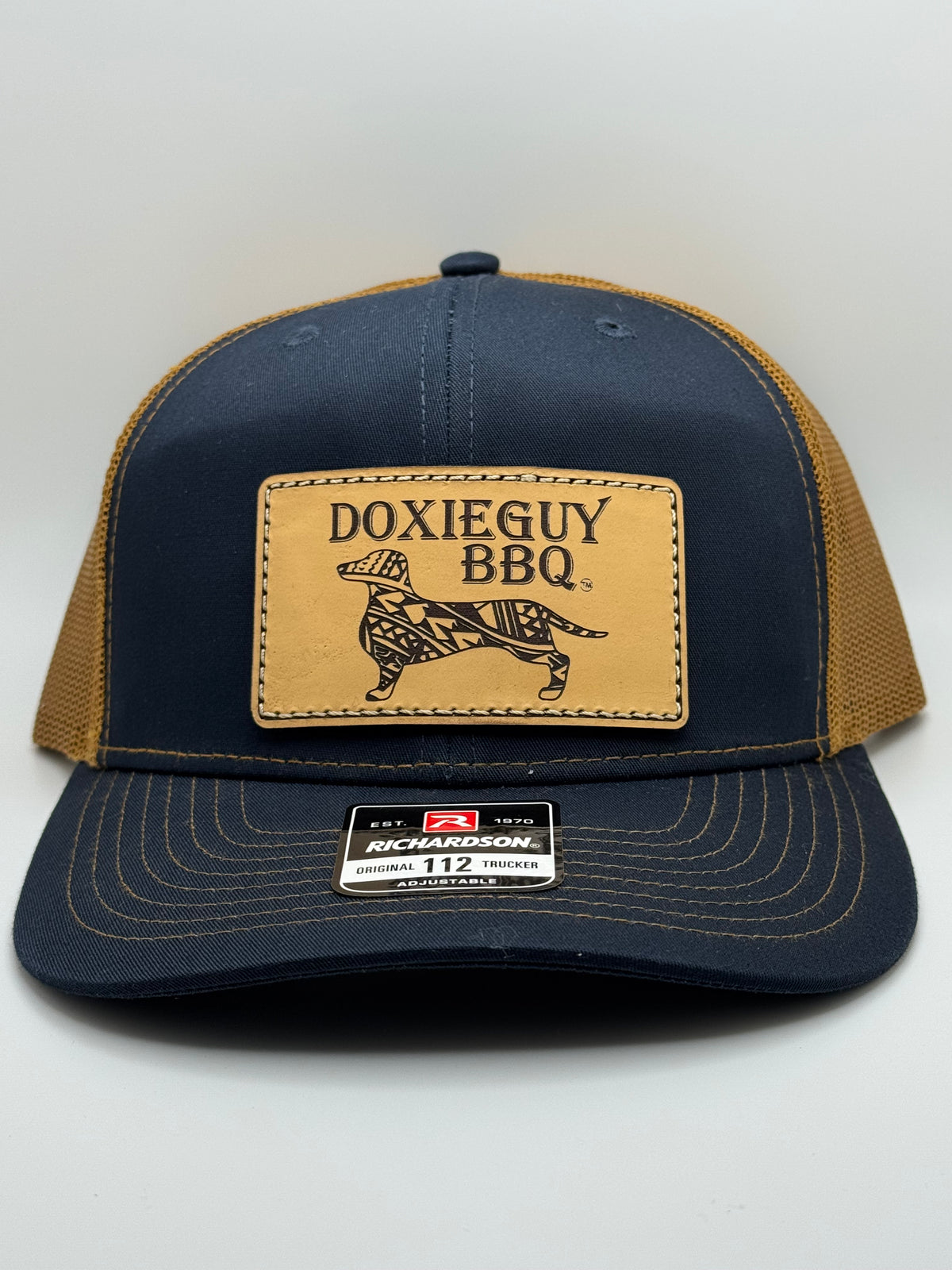 DoxieGuy BBQ Leather Patch Richardson 112 Trucker Cap Navy Blue/Caramel