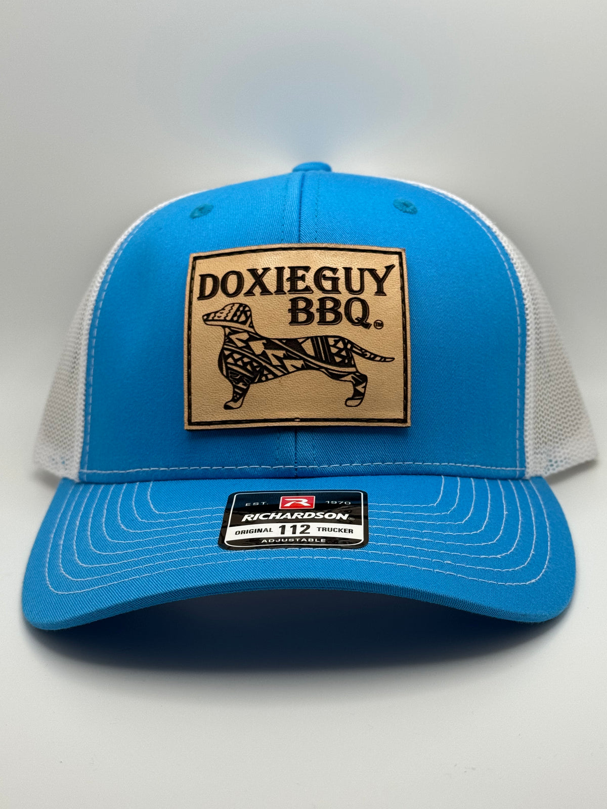 DoxieGuy BBQ Leather Patch Richardson 112 Trucker Cap Cyan/White